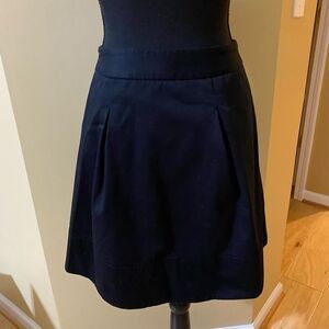 White House Black Market black A line skirt with pockets. Size 00.